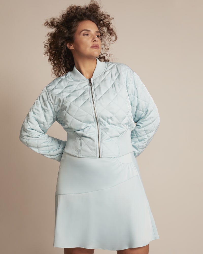Front of a model wearing a size 20 Erica Skirt in Light Blue by 11 Honoré Collection. | dia_product_style_image_id:245360